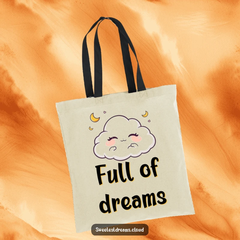 Funny tote bag showcasing a sleeping cloud character surrounded by small crescent moons, ideal for carrying dreams and essentials.